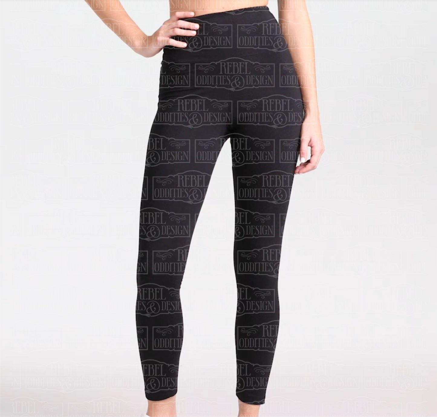 Front view of black leggings, the front has no designs decorating them.